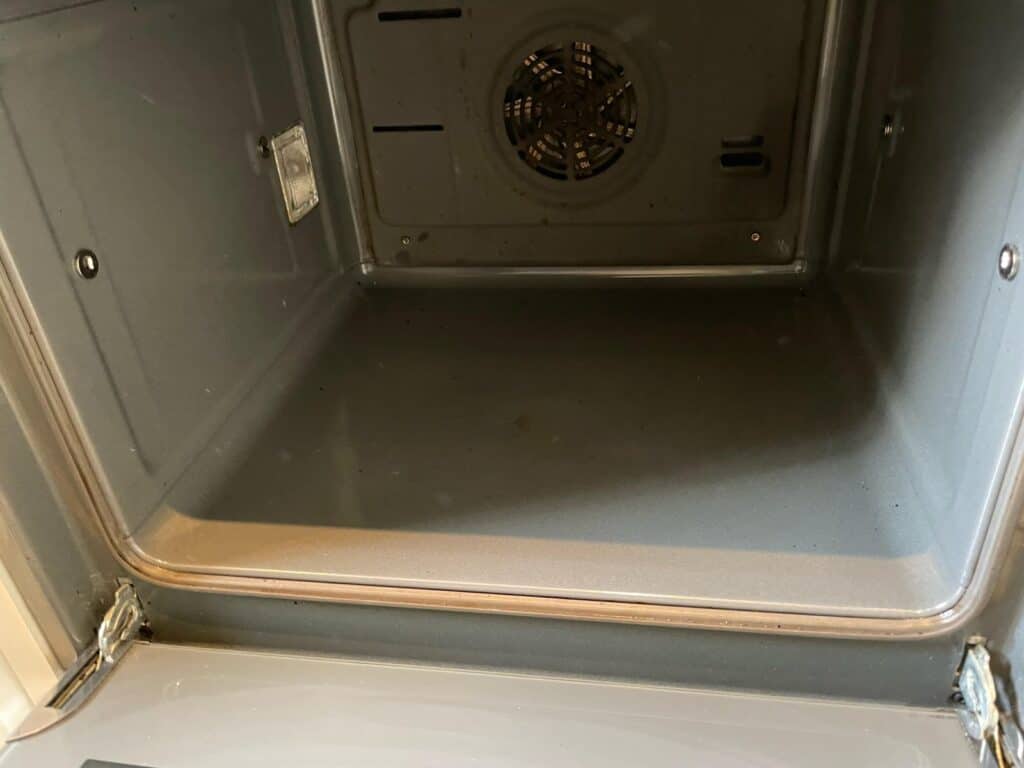 Clean oven interior after oven cleaning